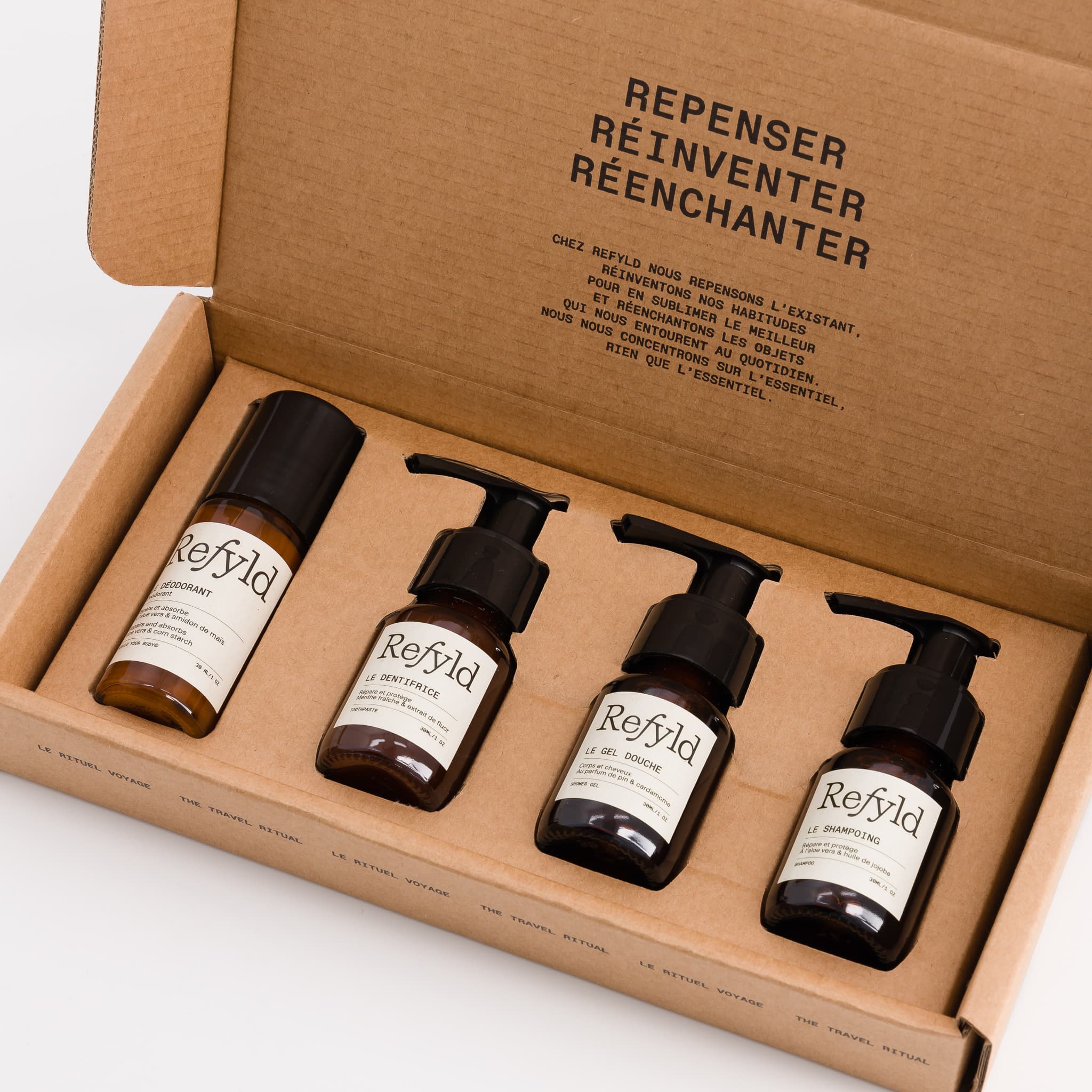 Coffret composé de 4 flacons en verre des soins best-seller format voyage de Refyld