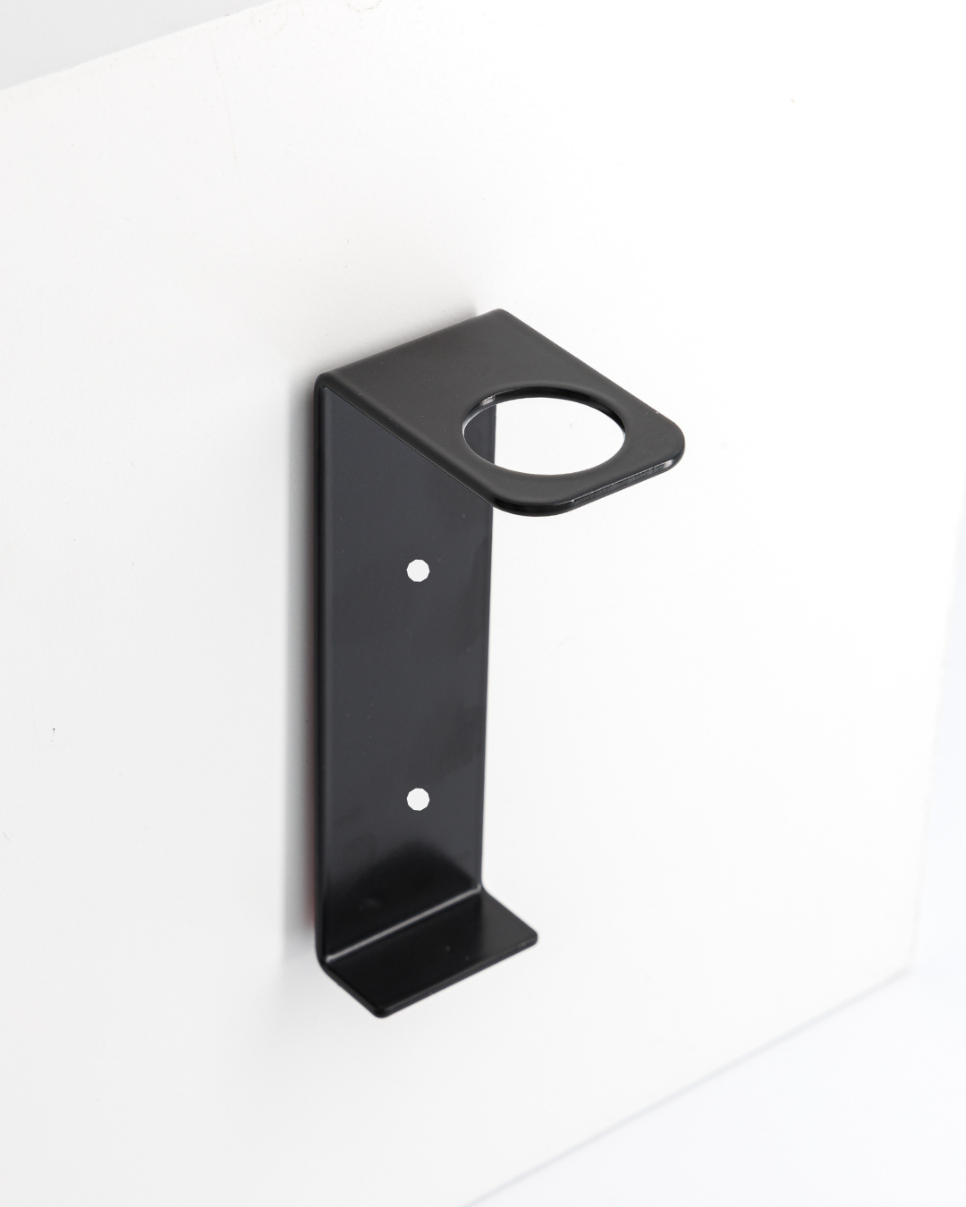 The adhesive wall mount